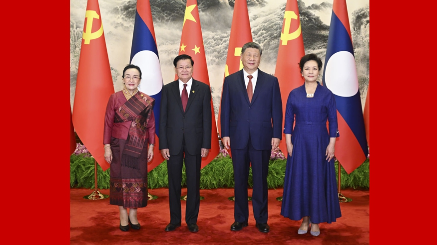 习近平同老挝人革党中央总书记、国家主席通伦会谈
